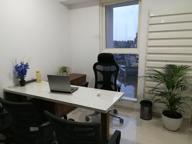 black chair and white table